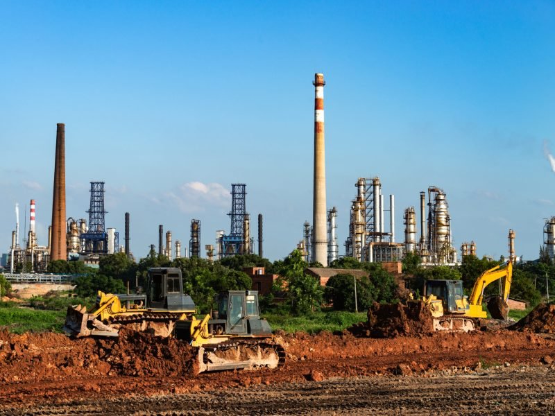 Excavators are assignments and refinery background